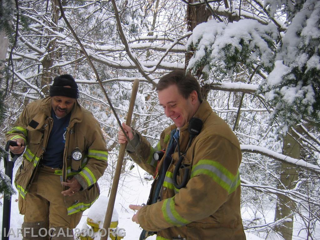 FF Sawyer and LT McCabe shoveling hydrants 2005